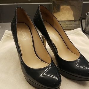 Navy patent leather pumps